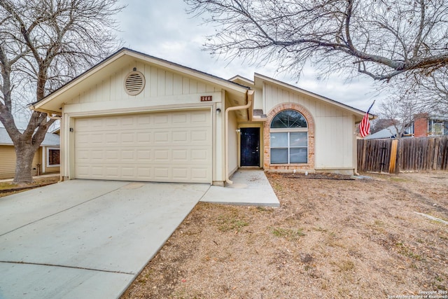 single story home featuring a garage