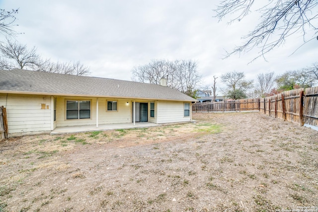 rear view of house with a patio area