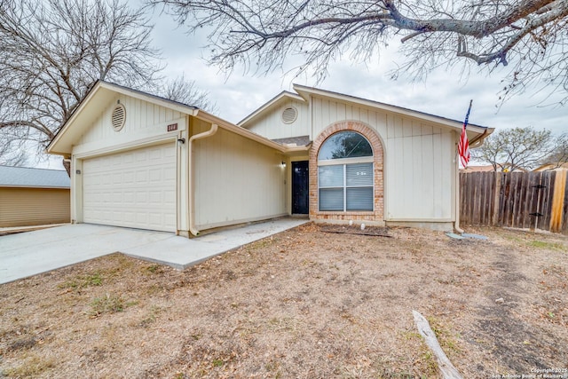 ranch-style house featuring a garage