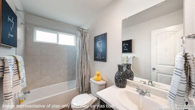 full bathroom with shower / tub combo, vanity, and toilet