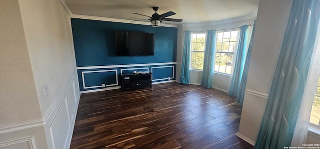 unfurnished living room featuring ceiling fan, dark hardwood / wood-style flooring, and ornamental molding