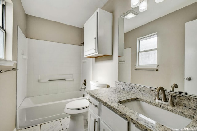 full bathroom with shower / bathing tub combination, vanity, and toilet