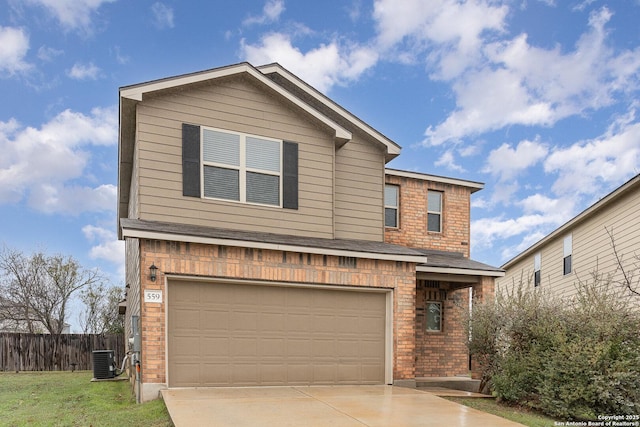 view of front of property featuring cooling unit and a garage