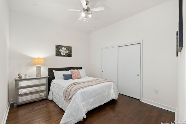 bedroom featuring a closet, ceiling fan, and dark hardwood / wood-style flooring