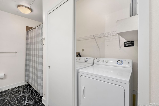 laundry area featuring washer and clothes dryer