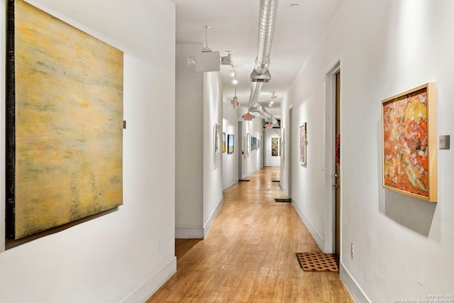 hall featuring light hardwood / wood-style flooring