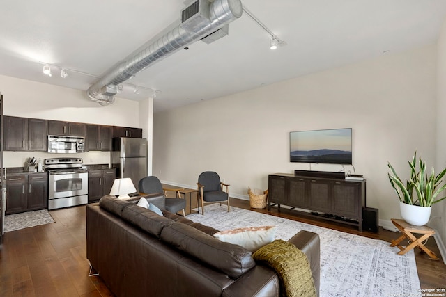 living room featuring dark hardwood / wood-style flooring