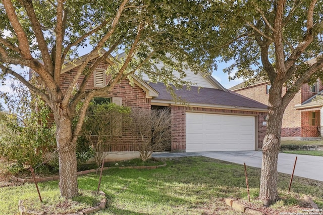 view of front facade with a front yard and a garage