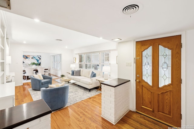 entrance foyer with hardwood / wood-style flooring