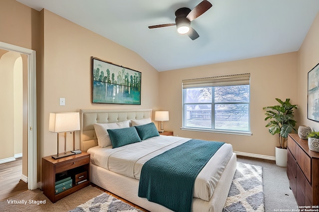 bedroom with ceiling fan and lofted ceiling