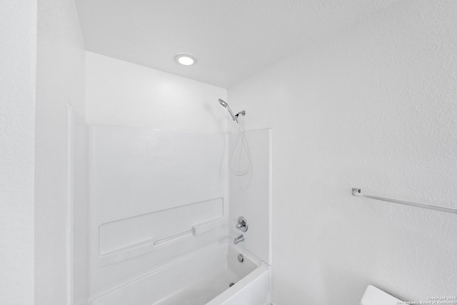 bathroom featuring shower / tub combination