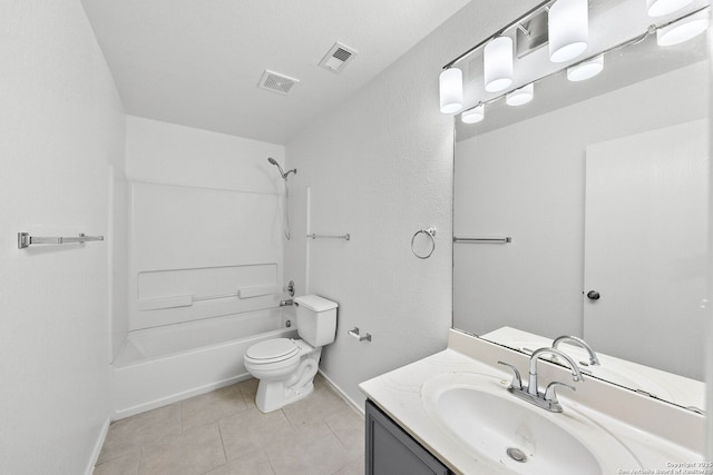 full bathroom featuring toilet, tile patterned flooring, washtub / shower combination, and vanity