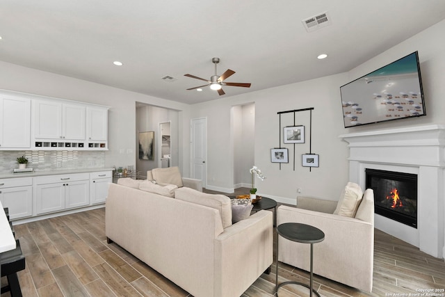 living room with ceiling fan