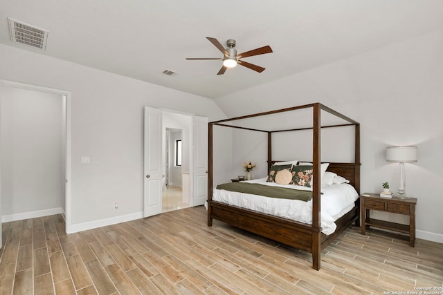 bedroom with lofted ceiling and ceiling fan