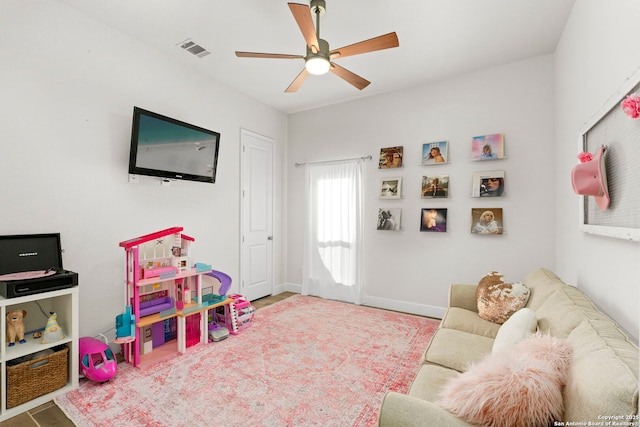 game room with ceiling fan and hardwood / wood-style flooring