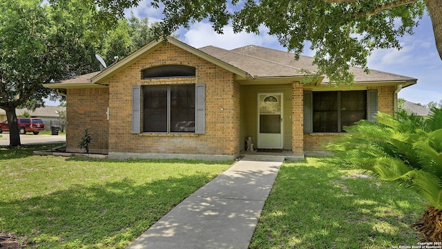 view of front of home with a front lawn