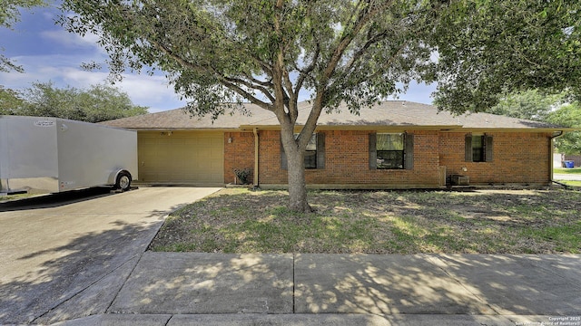 single story home featuring a garage