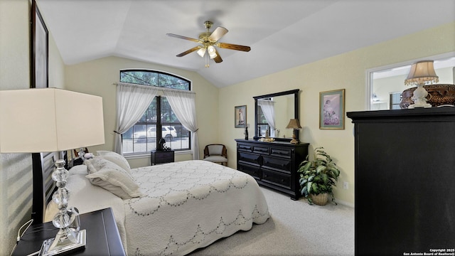 bedroom featuring carpet flooring, ceiling fan, and vaulted ceiling