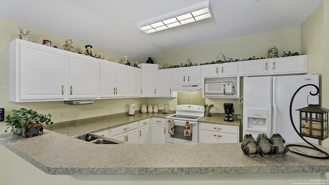 kitchen with white appliances, white cabinets, and sink