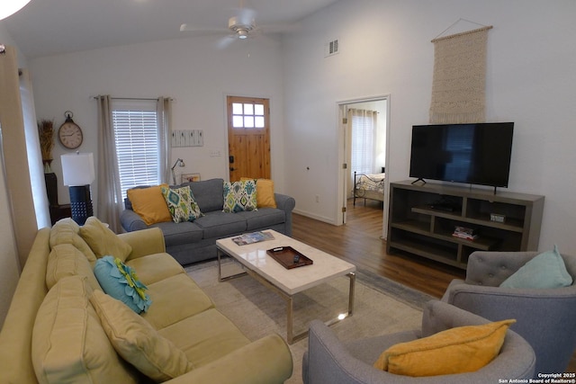 living room with ceiling fan and hardwood / wood-style floors