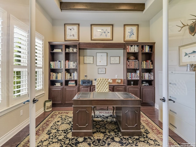 office featuring a raised ceiling, french doors, and dark hardwood / wood-style floors