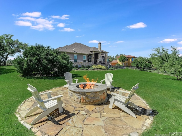 view of patio / terrace with a fire pit