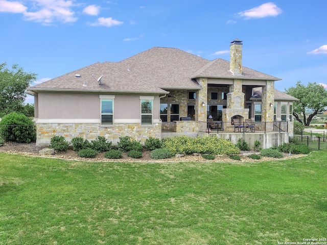 back of house featuring a yard