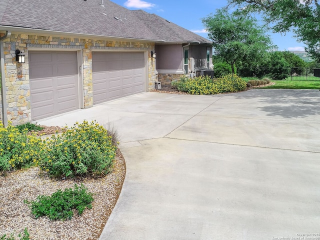 view of property exterior with a garage