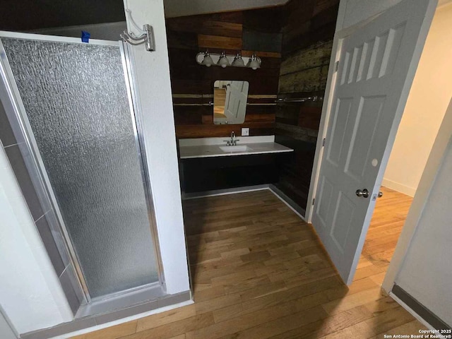 bathroom with sink and hardwood / wood-style floors