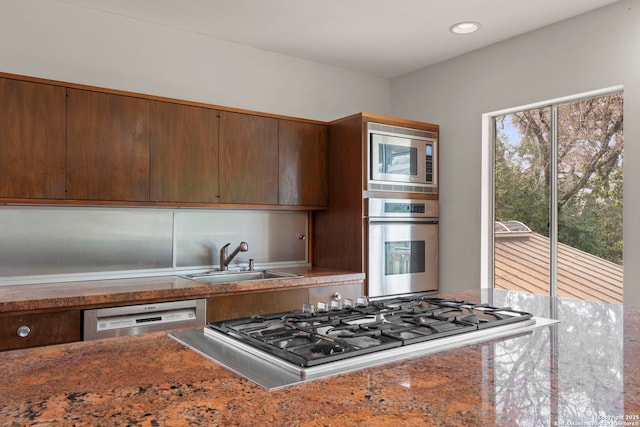 kitchen featuring stainless steel appliances and sink