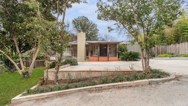 exterior space featuring a yard and a patio