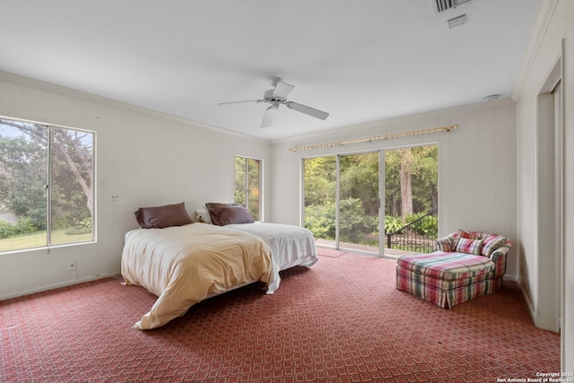 carpeted bedroom with ceiling fan, crown molding, and access to exterior