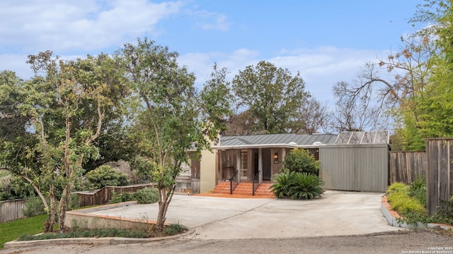 view of front of home with a lanai