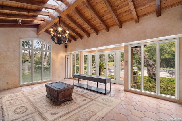 unfurnished sunroom featuring wood ceiling, an inviting chandelier, and lofted ceiling with beams