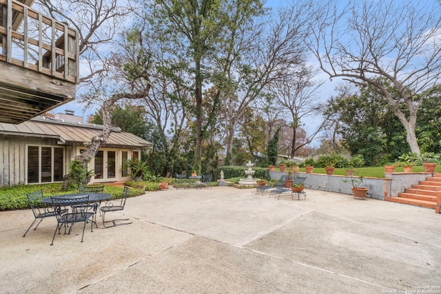 view of patio featuring french doors