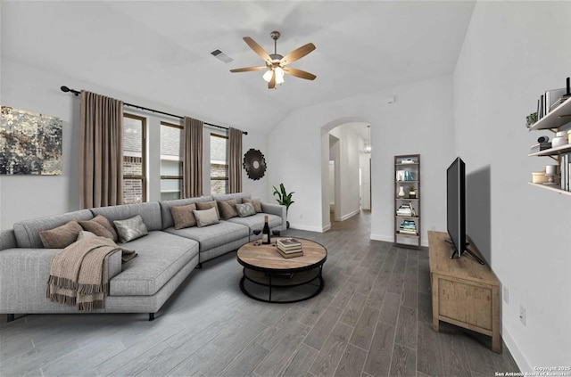 living room featuring lofted ceiling, ceiling fan, and dark hardwood / wood-style floors