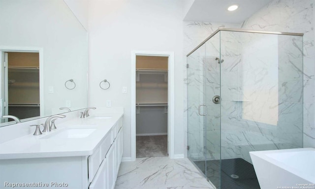 bathroom with separate shower and tub and vanity