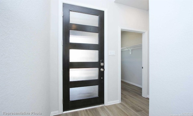 entrance foyer featuring light hardwood / wood-style floors