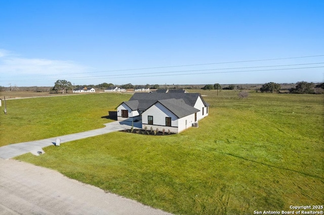 drone / aerial view with a rural view