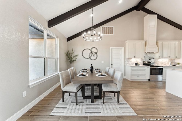 dining area featuring high vaulted ceiling, an inviting chandelier, and beam ceiling