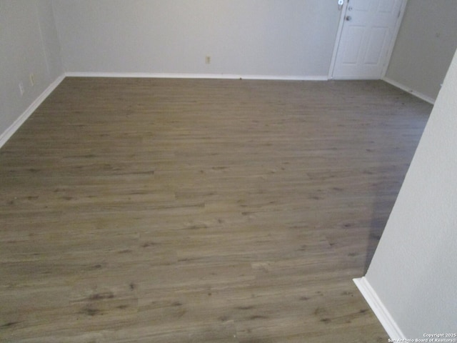 spare room featuring light wood-type flooring