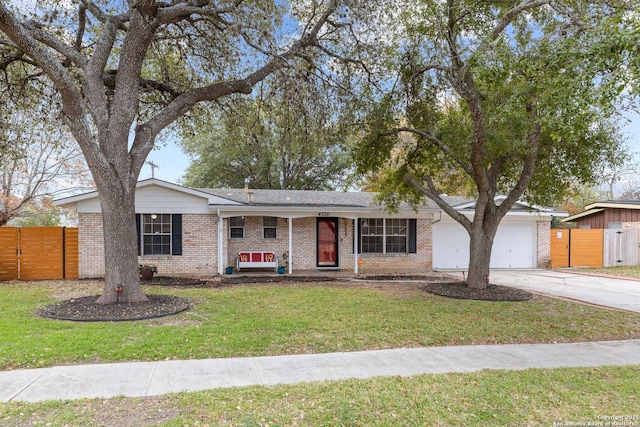 ranch-style house with a front lawn and a garage