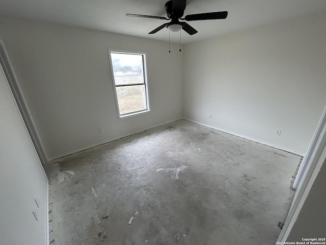 unfurnished room with ceiling fan