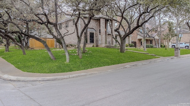 view of front of house featuring a front lawn