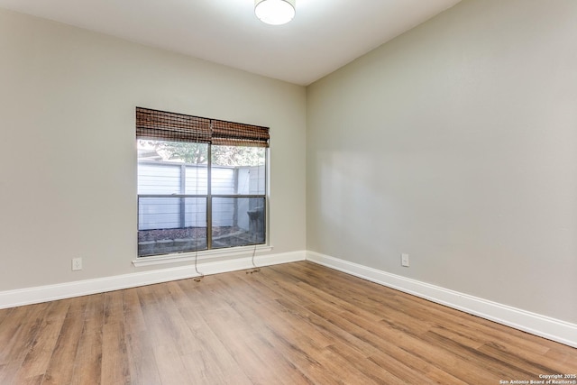 empty room with light wood-type flooring