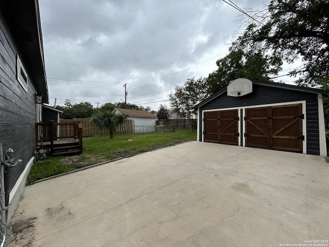 garage featuring a yard