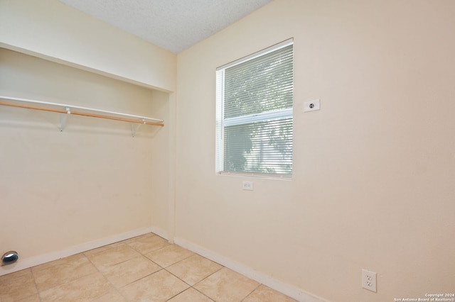 interior space with a textured ceiling