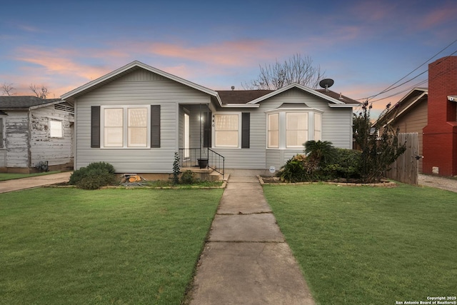 view of front facade with a lawn