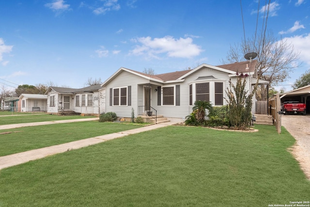 ranch-style home with a front lawn