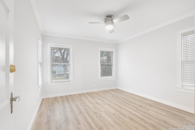 spare room with ceiling fan, light hardwood / wood-style floors, and crown molding